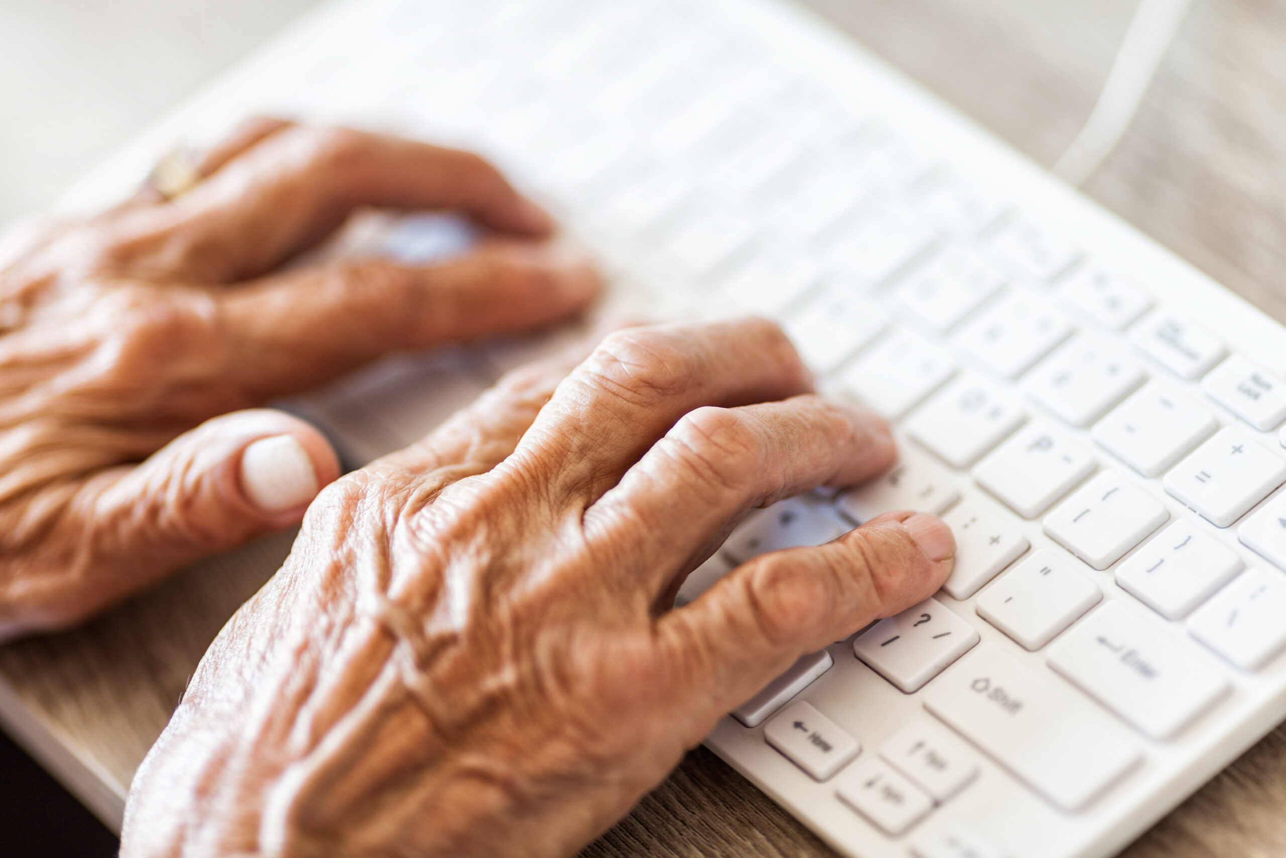Elderly Hands on Keyboard